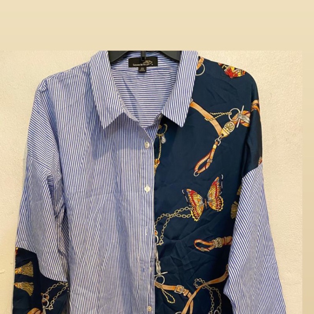 Suzanne Betro top.